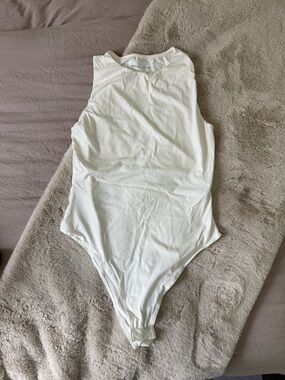 Sleeveless White Women’s Bodysuit - Minimal Crew Neck